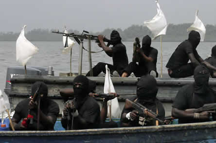 photo of men in masks with mounted machine guns, river in the background