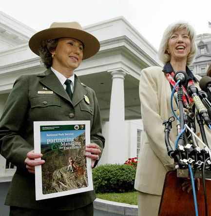Interior Secretary Glae Norton (right) and National Parks Service Director Fran Mainella talk to press following a meeting with George W. Bush at the White House, July 2, 2003. Norton and Mainella presented the president with a report on national parks. — REUTERS/Larry Downing